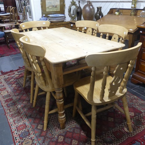 407 - A pine kitchen Table with six Chairs, only one frieze drawer present, W 136cm x H 77cm x D 76cm (tab... 