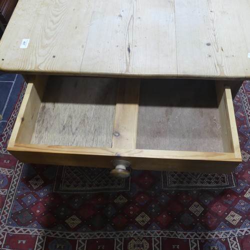 407 - A pine kitchen Table with six Chairs, only one frieze drawer present, W 136cm x H 77cm x D 76cm (tab... 