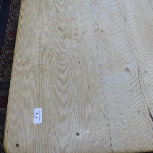 407 - A pine kitchen Table with six Chairs, only one frieze drawer present, W 136cm x H 77cm x D 76cm (tab... 