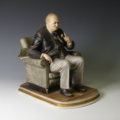 68 - A limited edition Capodimonte figure of Winston Churchill, designed by Bruno Merli, modelled in a se... 