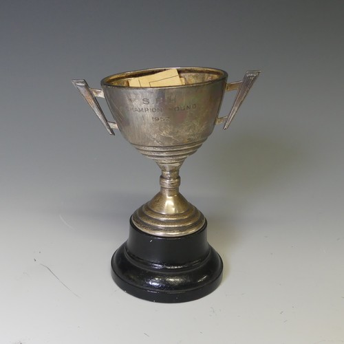 273 - A George V silver two handled Trophy Cup, hallmarked Birmingham 1935, in the Art Deco style, with la... 