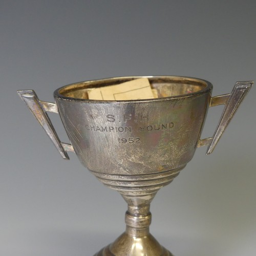 273 - A George V silver two handled Trophy Cup, hallmarked Birmingham 1935, in the Art Deco style, with la... 