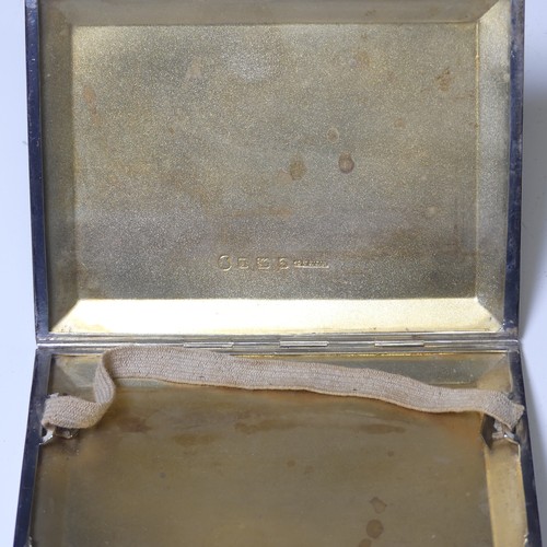 283 - A George V silver Cigarette Case, by W T Toghill & Co., hallmarked Birmingham 1935, with engine ... 