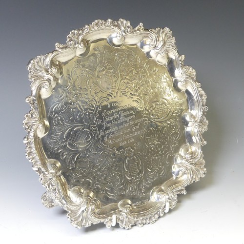 286 - A Victorian silver Salver, hallmarked Newcastle, 1874, makers mark 'I.W', of circular form with elab... 