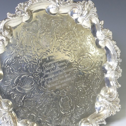 286 - A Victorian silver Salver, hallmarked Newcastle, 1874, makers mark 'I.W', of circular form with elab... 