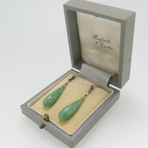 116 - A pair of vintage jade drop Earrings, with seed pearl surmount and stud fittings, the jades 2.5cm lo... 