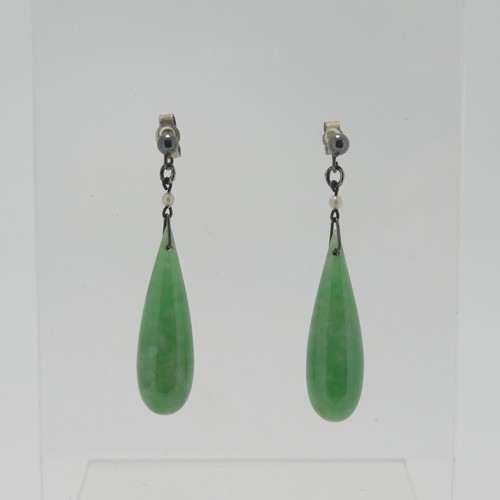 116 - A pair of vintage jade drop Earrings, with seed pearl surmount and stud fittings, the jades 2.5cm lo... 