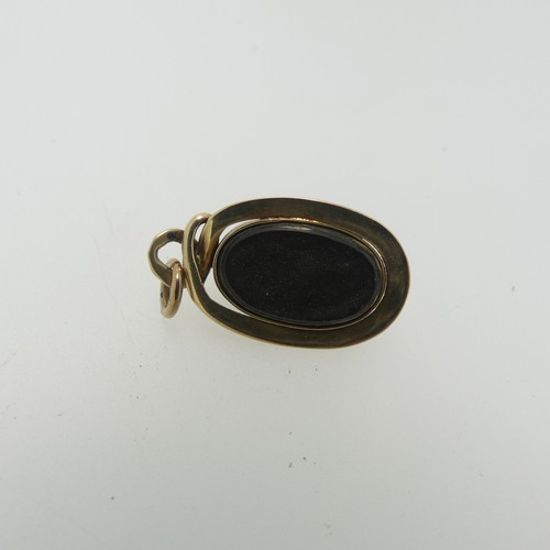 68 - A 19thC cabochon garnet Pendant, the unmarked mount in the form of a coiled snake, box and glass rev... 