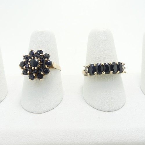15 - A sapphire cluster Ring, mounted in 9ct yellow gold, Size O½,together with a five stone sapph... 