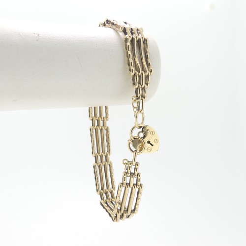 93 - A 9ct yellow gold gatelink Bracelet, with 9ct gold padlock clasp, approx total weight 10.7g.... 