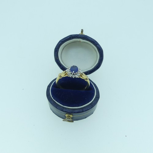 29 - A small sapphire and diamond cluster Ring, cluster total 8.5mm, on a 9ct gold shank, Size M, togethe... 