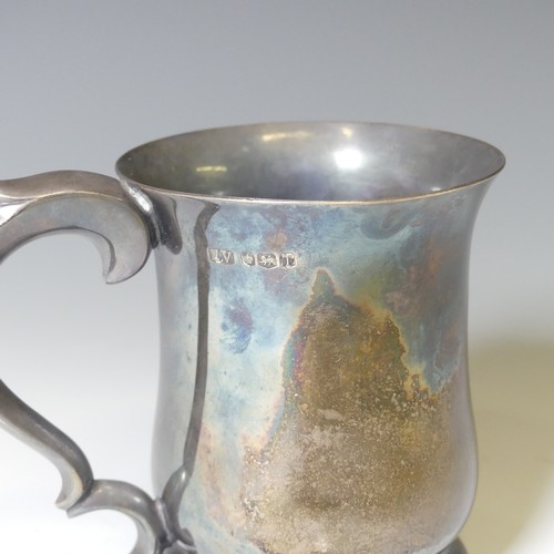 305 - An Elizabeth II silver Christening Mug, by Viner's Ltd., of baluster form with leaf capped scroll ha... 