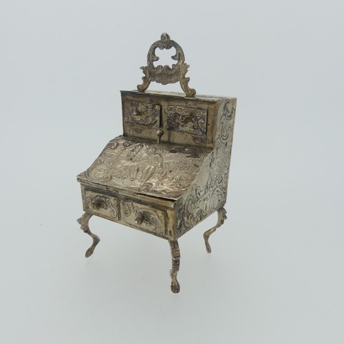 307 - A 19thC Dutch silver miniature Bureau, import marks for David Bridge, London, 1894, with hinged open... 