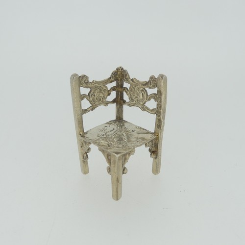 309 - A 19thC Dutch silver miniature Corner Chair, with Shefiield import marks for Samuel Boyce (or Boaz) ... 