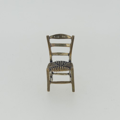 309 - A 19thC Dutch silver miniature Corner Chair, with Shefiield import marks for Samuel Boyce (or Boaz) ... 