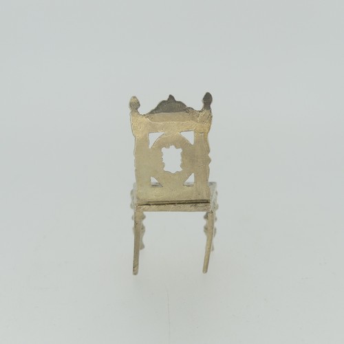 309 - A 19thC Dutch silver miniature Corner Chair, with Shefiield import marks for Samuel Boyce (or Boaz) ... 