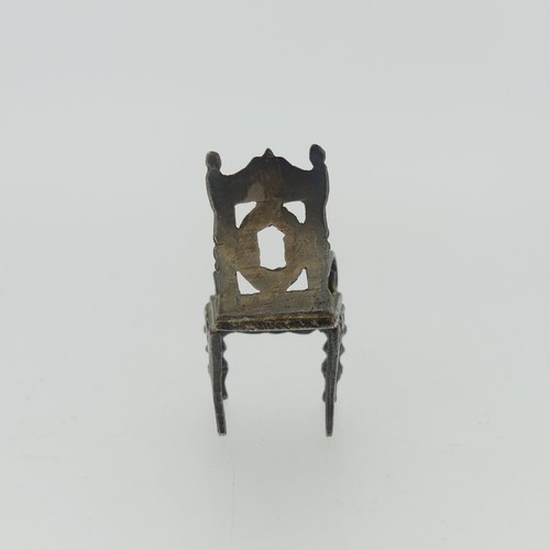 309 - A 19thC Dutch silver miniature Corner Chair, with Shefiield import marks for Samuel Boyce (or Boaz) ... 