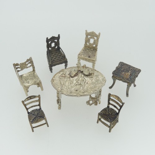 309 - A 19thC Dutch silver miniature Corner Chair, with Shefiield import marks for Samuel Boyce (or Boaz) ... 