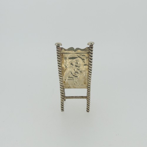 310 - A set of three Continental silver Chairs, with London hallmarks for 1903, 5cm high, together with a ... 