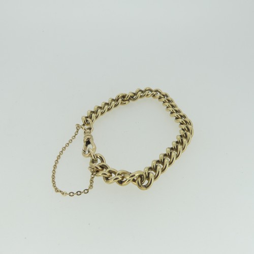 97 - A 9ct yellow gold curb link Bracelet, with watch chain clip fastening, 17cm long, approx total weigh... 