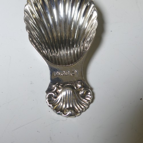 320 - An Elizabeth II silver Caddy Spoon, by Francis Howard Ltd., hallmarked Sheffield, 1988, with scallop... 