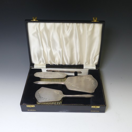 326 - An Elizabeth II cased silver mounted Dressing Table Set, by W G Sothers Ltd., the hand mirror and sm... 