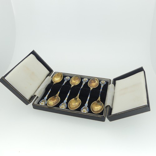 329 - A set of six Elizabeth II silver gilt and enamel Coffee Spoons, by Turner & Simpson Ltd., hallma... 