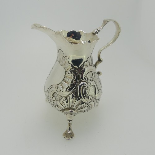 341 - A George II silver Cream Jug, by Samuel Meriton I, hallmarked London, 1746, of traditional form with... 