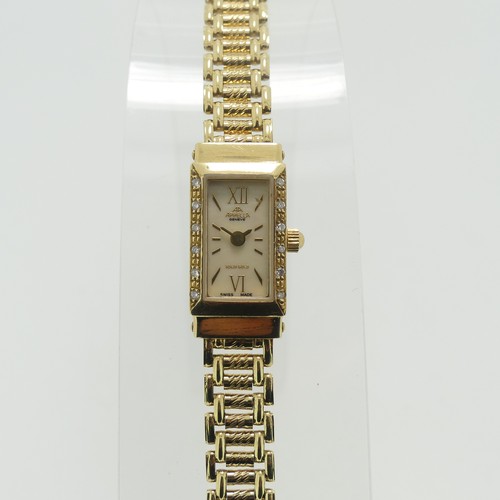 202 - An 18ct yellow gold lady's Appella Wristwatch, ref. 852, with rectangular mother of pearl dial, gold... 