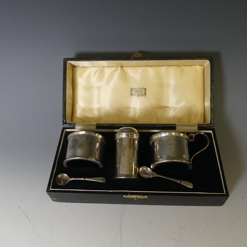 354 - A cased George V silver three piece Cruet Set, by Harrods Ltd., hallmarked London, 1934, of circular... 