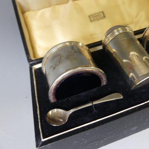 354 - A cased George V silver three piece Cruet Set, by Harrods Ltd., hallmarked London, 1934, of circular... 