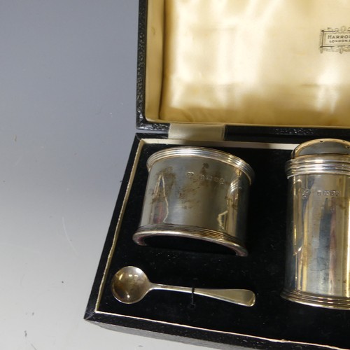 354 - A cased George V silver three piece Cruet Set, by Harrods Ltd., hallmarked London, 1934, of circular... 