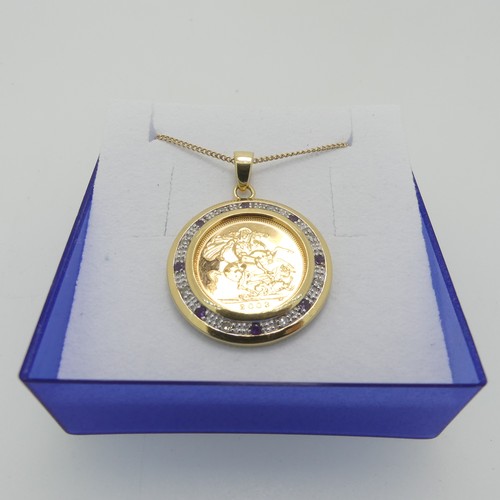 240 - An Elizabeth II gold Half Sovereign, dated 2003, in 9ct gold circular pendant mount set with alterna... 