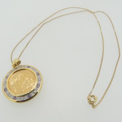 240 - An Elizabeth II gold Half Sovereign, dated 2003, in 9ct gold circular pendant mount set with alterna... 