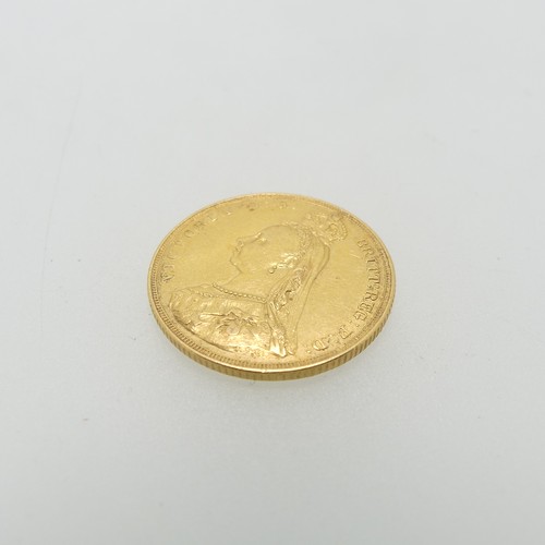 241 - A Victorian gold Sovereign, dated 1887.