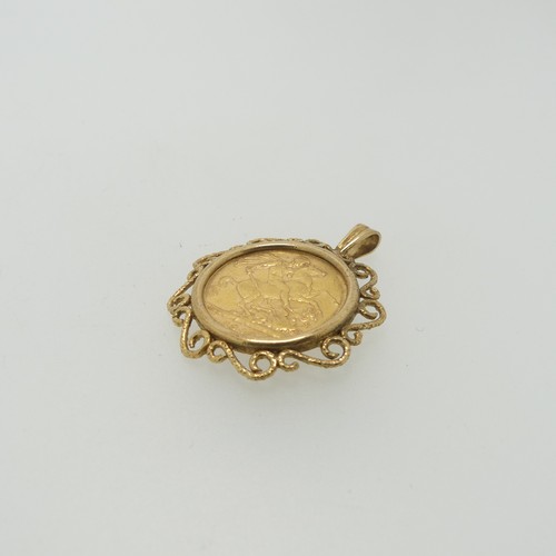 246 - A Victorian gold Sovereign, dated 1890, in a 9ct gold open scrolling pendant mount, total weight 11.... 