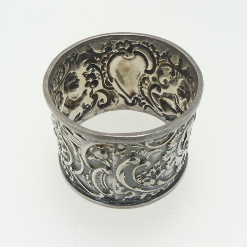 365 - A Victorian silver Napkin Ring, by William Richard Corke, hallmarked London, 1895, 1.27ozt, together... 