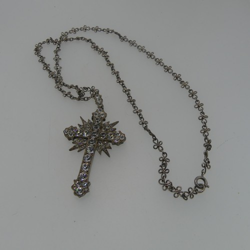 85 - A paste set Cross Pendant, with corresponding paste set suspension loop, total length 7cm, all in un... 