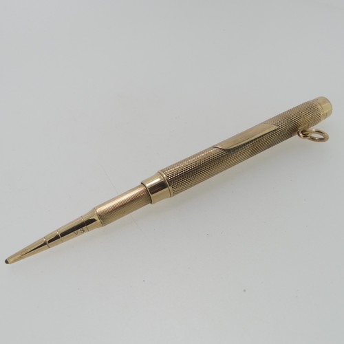 178 - Sampson Mordan; A 9ct gold Propelling Pencil, hallmarked London, 1916, the body with engine turned d... 