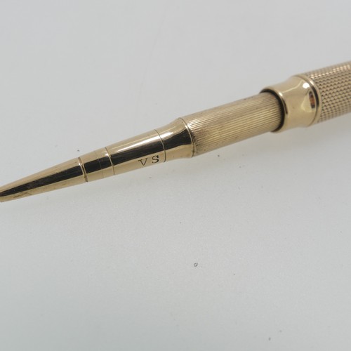 178 - Sampson Mordan; A 9ct gold Propelling Pencil, hallmarked London, 1916, the body with engine turned d... 