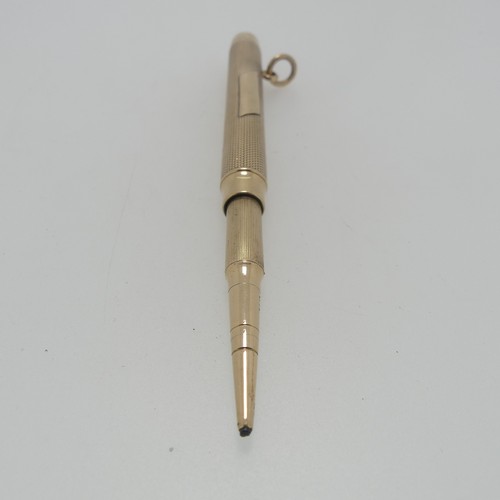 178 - Sampson Mordan; A 9ct gold Propelling Pencil, hallmarked London, 1916, the body with engine turned d... 