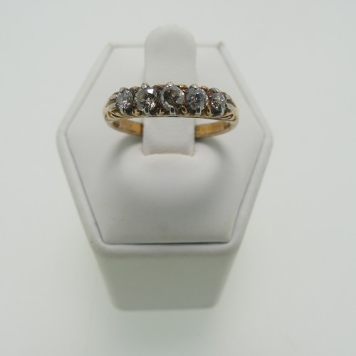 180 - A graduated five stone diamond Ring, the old cut stones, total weight approx. 0.4ct claw set in a sc... 