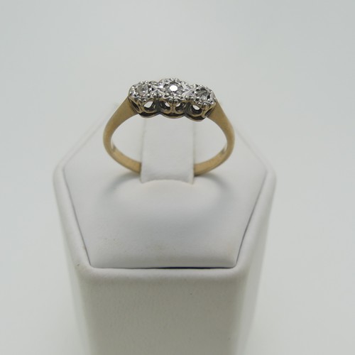 181 - A small diamond flowerhead cluster Ring, mounted in 9ct yellow and white gold, Size N, together with... 