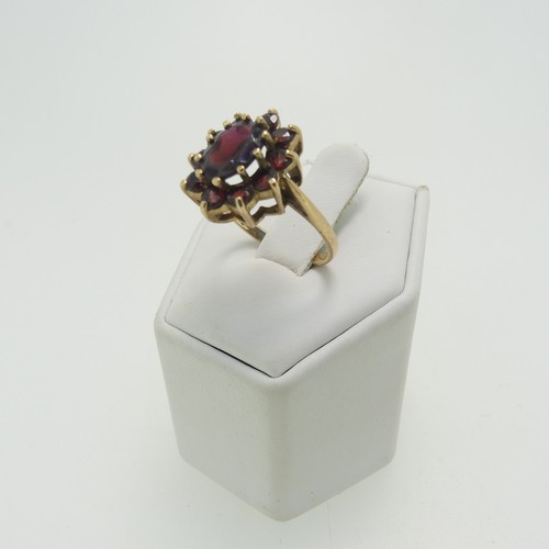 57 - A 9ct gold garnet cluster Ring, Size O, together with a small ruby five stone ring, Size P½, a small... 