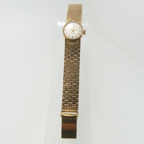 207 - A 9ct yellow gold Record deLuxe lady's Wristwatch, with 17-jewels movement, gold hands and baton mar... 