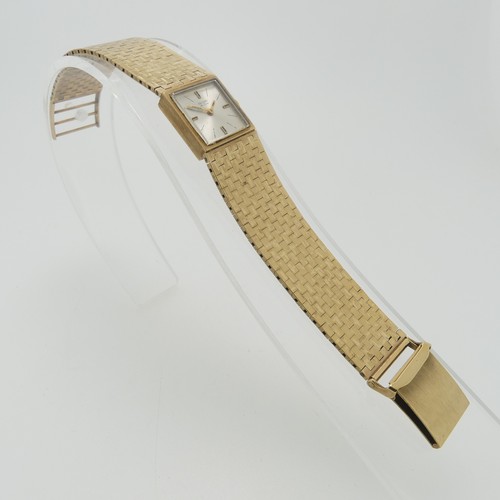 208 - A 9ct yellow gold Record DeLuxe lady's Wristwatch, the square silvered dial with Swiss 17-jewels mov... 