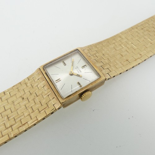 208 - A 9ct yellow gold Record DeLuxe lady's Wristwatch, the square silvered dial with Swiss 17-jewels mov... 