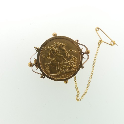 250 - A George V gold Sovereign, dated 1915, in a 9ct gold brooch mount, gross total weight 10.7g.... 