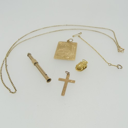 182 - A 9ct yellow gold retractable toothpick, 4.6cm long closed, together with a 9ct gold cross pendant a... 