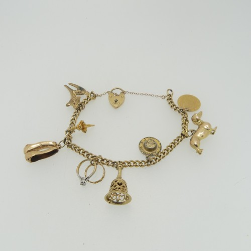 106 - A 9ct yellow gold curb link Bracelet, with 9ct padlock clasp, with a Napoleon III 5 Franc coin suspe... 